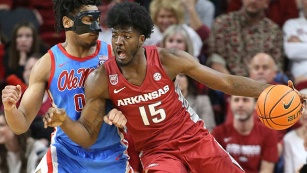 Arkansas center Makhi Mitchell pushes the ball inside against Ole Miss.